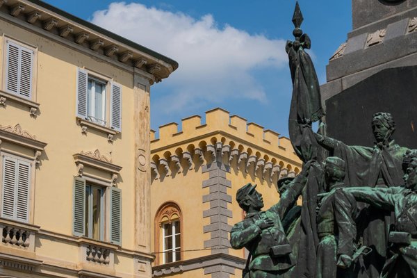 What are the best historical re-enactment sites in the UK for a hands-on learning experience?